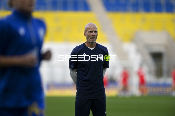 Trainer auf dem Spielfeld