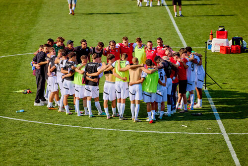 Teamkreis vor Spiel