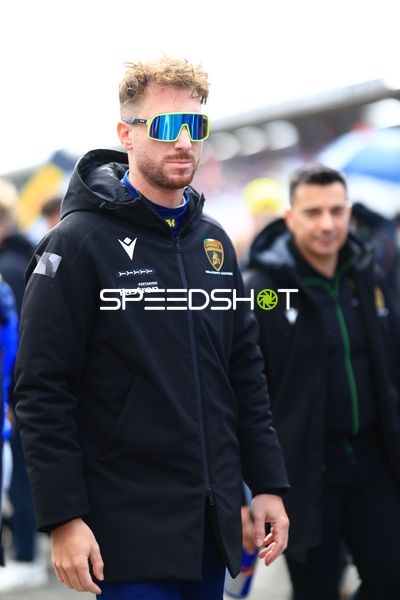 Teammitglied im Fahrerlager