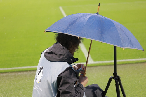 Person am Spielfeldrand