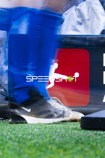 Fußballschuhe auf Rasen