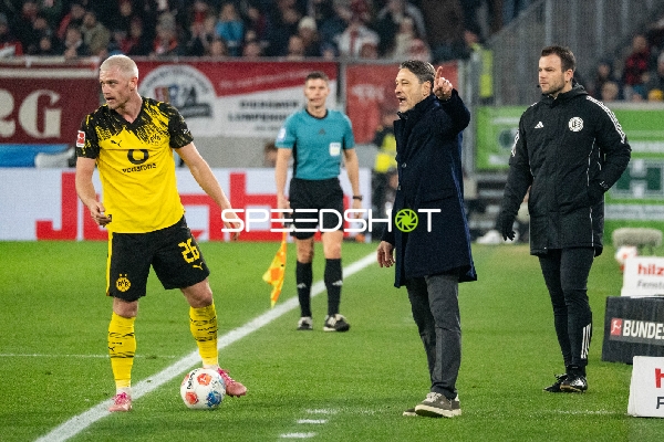 Spieler und Trainer in Aktion