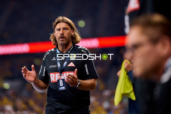 Trainer gestikuliert