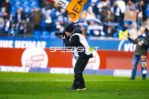 Fotograf auf dem Spielfeld