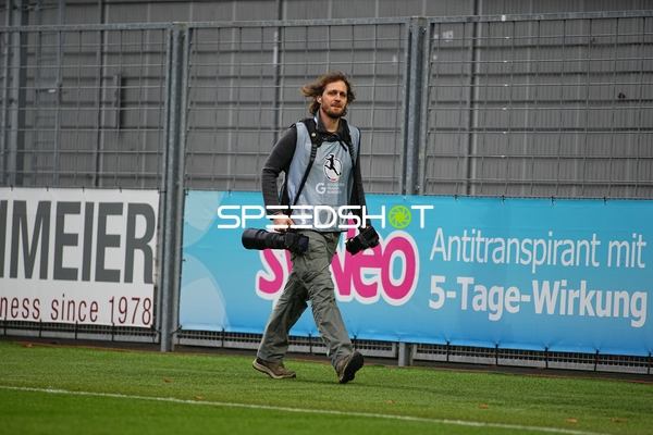 Fotograf auf dem Spielfeld