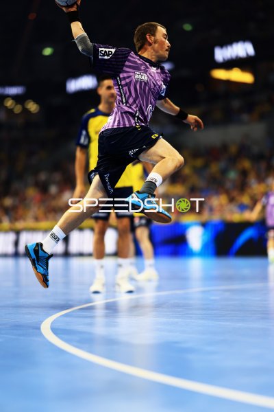 Team Apfel Spieler beim Sprungwurf in der SAP Arena Mannheim