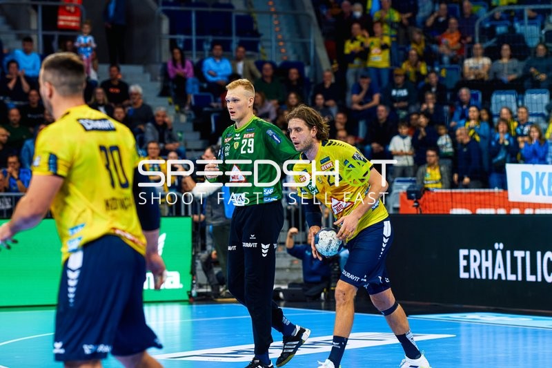 Spieler von Rhein Neckar Löwen auf dem Spielfeld