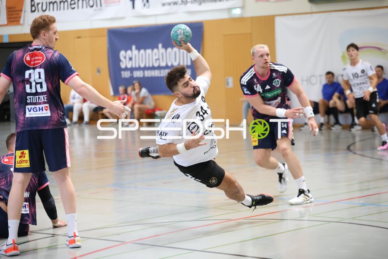 Paul-Louis Guiraudou (#34; PAUC Handball) beim Sprungwurf gegen TSV Hannover Burgdorf