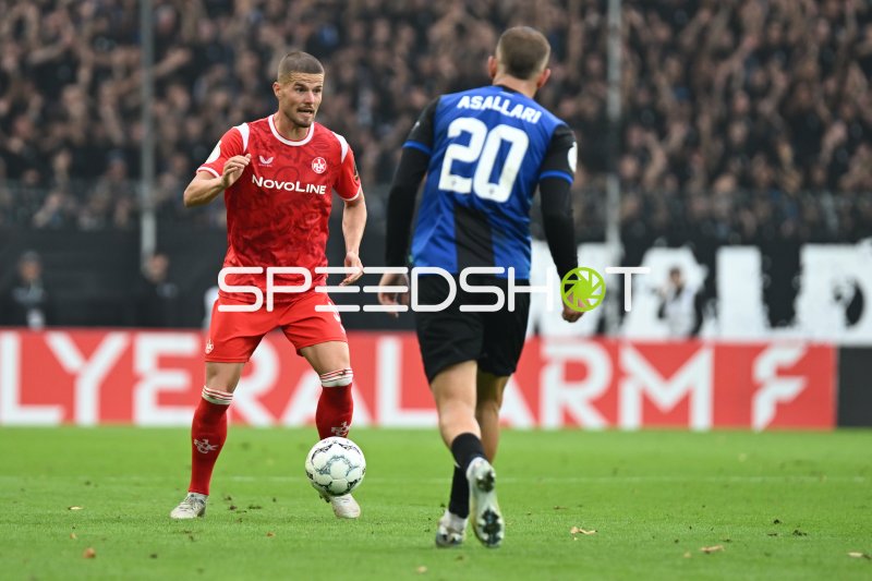 Jan Elvedi (#33; 1. FC Kaiserslautern) im Duell mit Kushtrim Asallari (#20; SV Waldhof Mannheim)