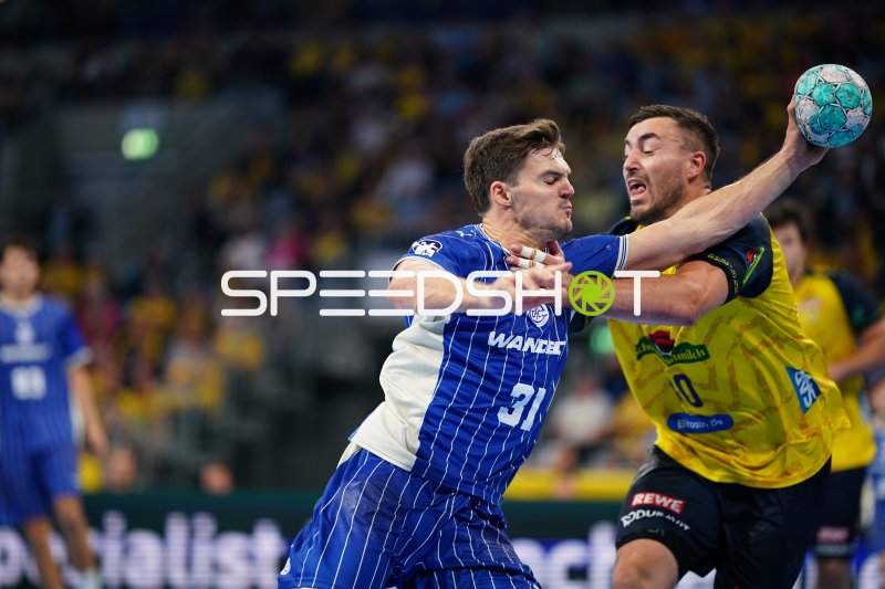 Jannik Kohlbacher (#80; Rhein Neckar Löwen) im Zweikampf gegen Kay Smits (#31; VfL Gummersbach)