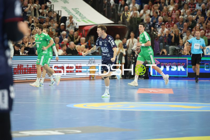 Spieler der Füchse Berlin im Laufspiel gegen SG Flensburg Handewitt