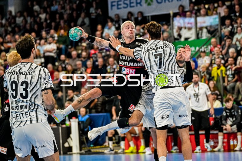 Marek Nissen (#6, HC Erlangen) im Sprungwurf gegen THW Kiel