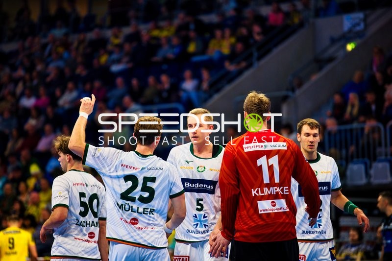 Spielerbesprechung auf dem Feld