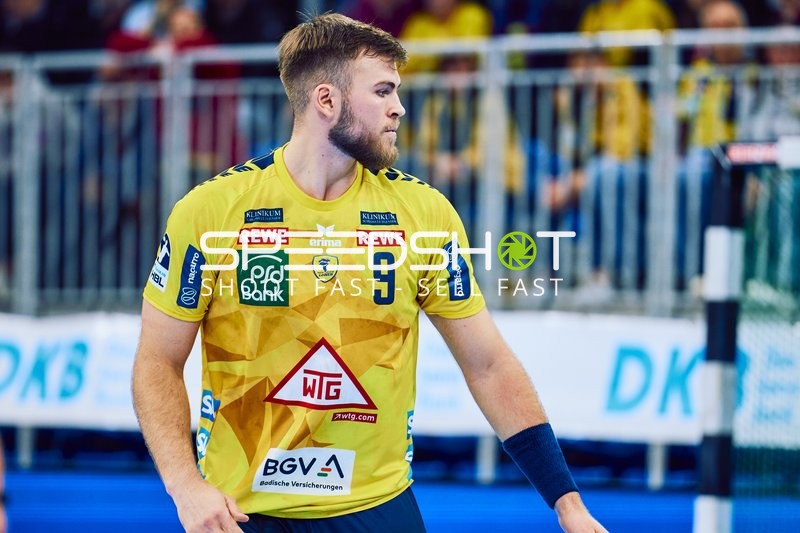 Spieler von Rhein Neckar Löwen auf dem Spielfeld.