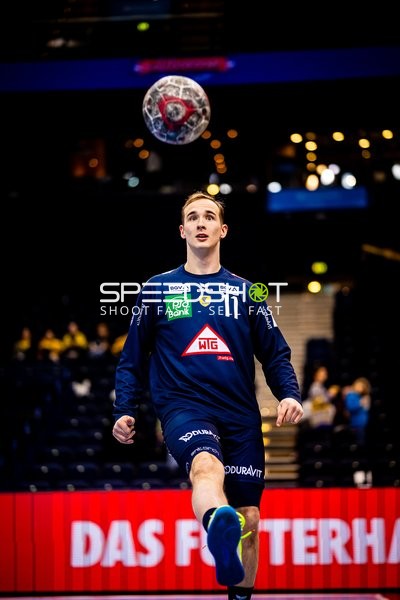 Spieler in Aktion mit Ball