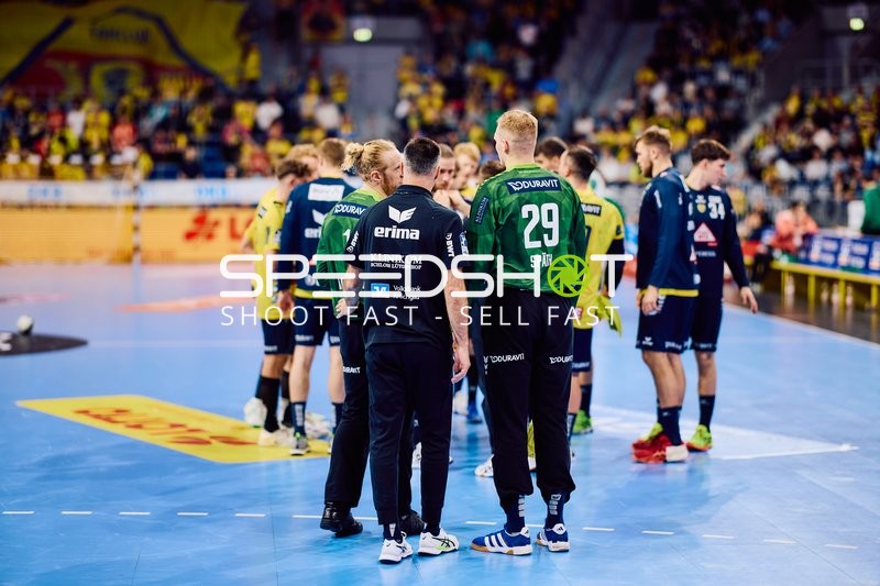 Spielerbesprechung auf dem Feld