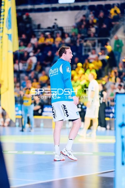 TBV Lemgo Spieler im Aufwärmtrikot