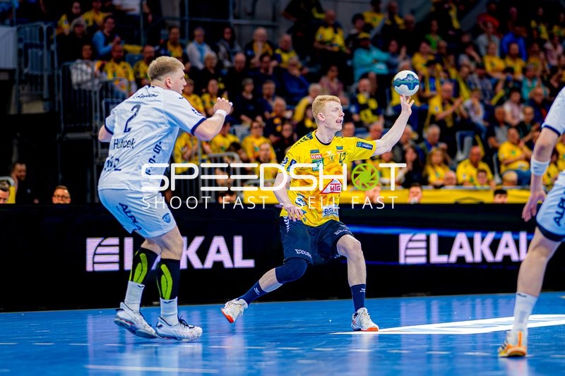 Rhein-Neckar Löwen Spieler beim Wurf