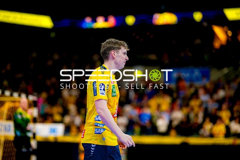 Rhein-Neckar Löwen Spieler in Aktion gegen TBV Lemgo