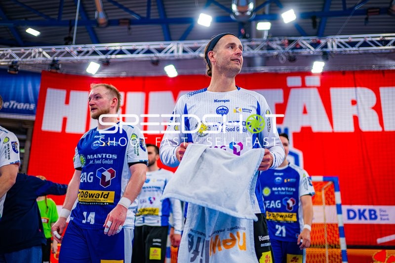 Spieler mit Handtuch