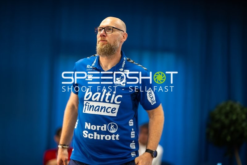 Trainer in SG Flensburg Handewitt Polo-Shirt