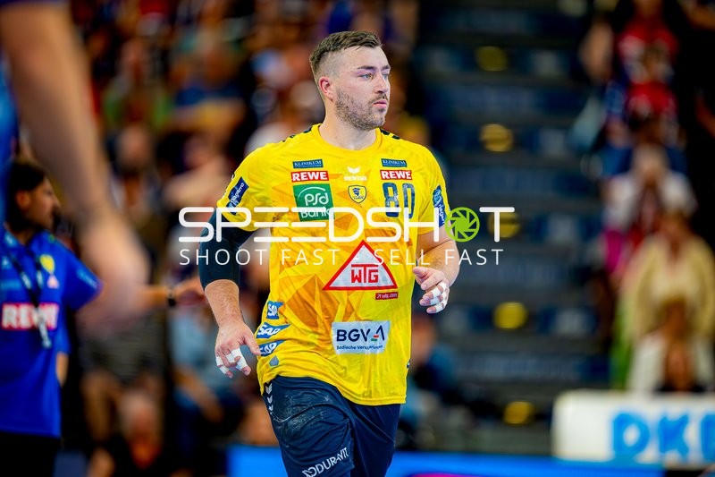 Spieler läuft Jannik Kohlbacher (80;Rhein Neckar Löwen)
