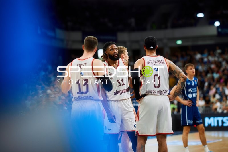 Drei Spieler des FC Bayern Basketball