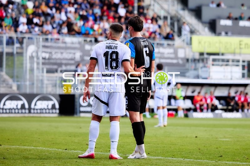 Duell zwischen Berk Inaler (18; SV Sandhausen) und 6; FSV Frankfurt
