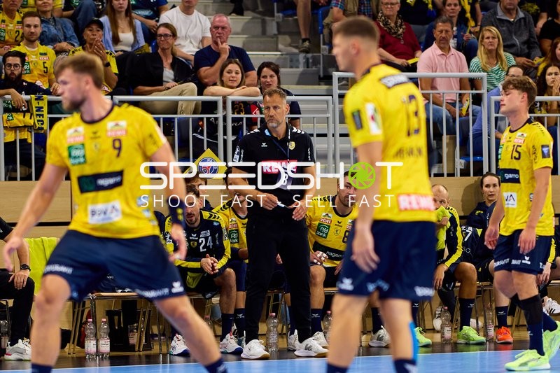 Handball Mannschaft und Trainer