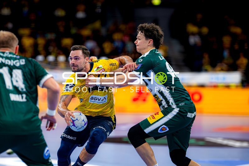 Kampf um den Ball zwischen Dani Baijens (77; Rhein Neckar Löwen) und Tillman Leu (99; ThSV Eisenach)