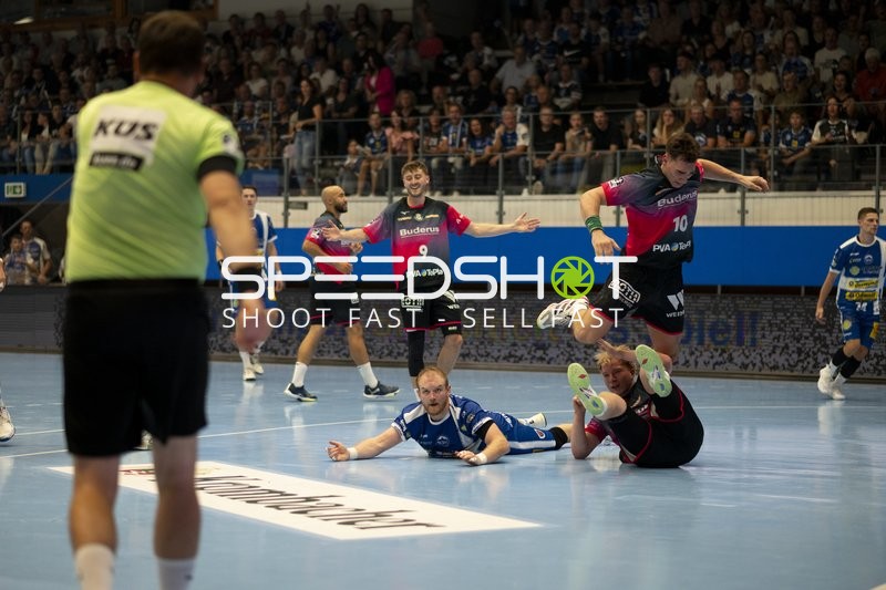 Niklas Theiß (9; HSG Wetzlar) und Peter Walz (14; ThSV Eisenach) in Aktion