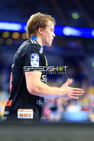 Handball-Szene mit Spieler von HC Erlangen