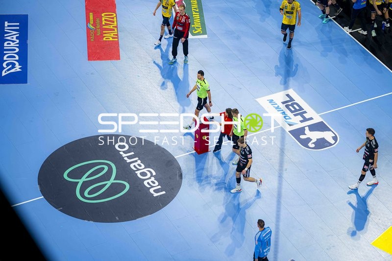 Handball-Szene mit Spielern von Rhein Neckar Löwen und HC Erlangen