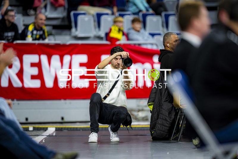Fotograf bei Handballspiel