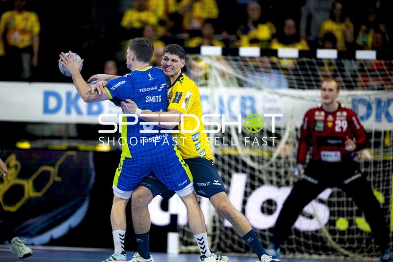 Sebastian Heymann (13; Rhein Neckar Löwen) und David Späth (29; Rhein Neckar Löwen) in Aktion