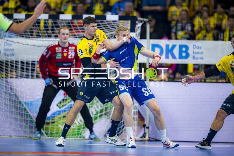 Sebastian Heymann (13; Rhein Neckar Löwen) und David Späth (29; Rhein Neckar Löwen) in Aktion