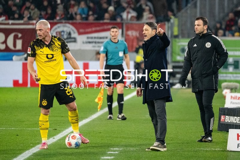 Spieler und Trainer in Aktion