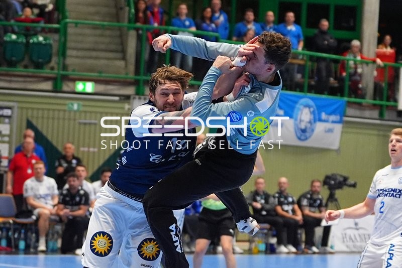 Gerdas Babarskas (14; Bergischer HC) und Lukas Hutecek (2; TBV Lemgo) im Zweikampf