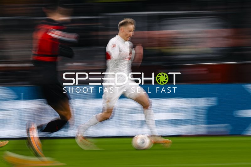 Spieler mit Ball in Aktion