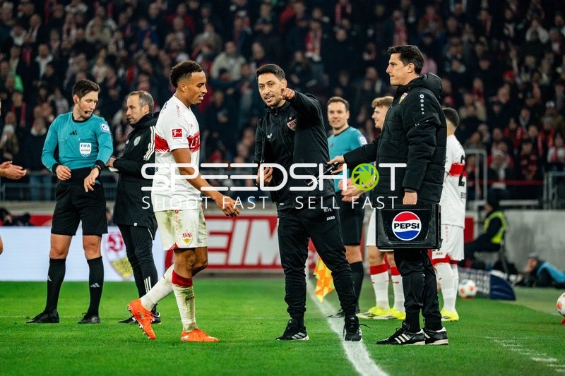 Spieler und Trainer im Austausch