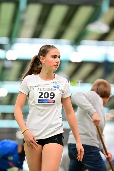 Athletin mit Startnummer 209 im Glaspalast