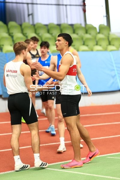 Athleten im Gespräch im Glaspalast