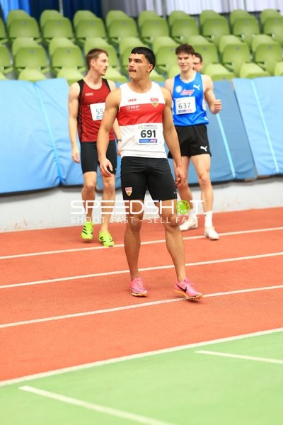 Athleten mit Startnummern im Glaspalast