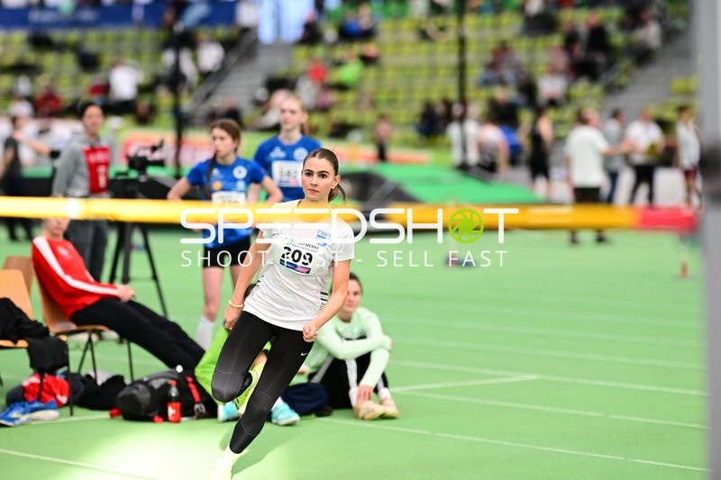 Leichtathletin mit Startnummer 209