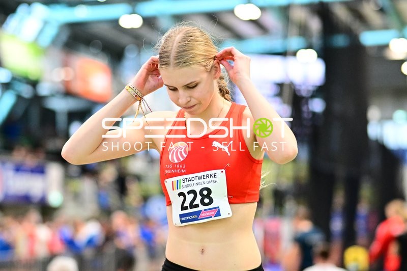 Athletin mit Startnummer 228