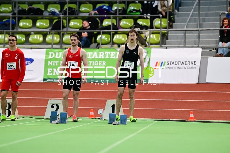 Athleten am Startblock im Glaspalast