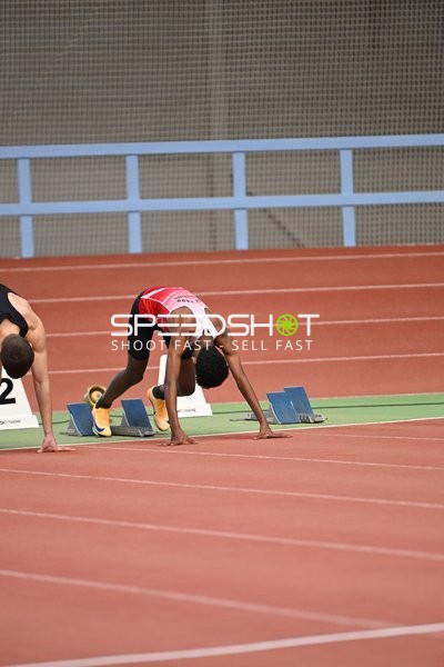 Athleten in Startposition beim Sprint