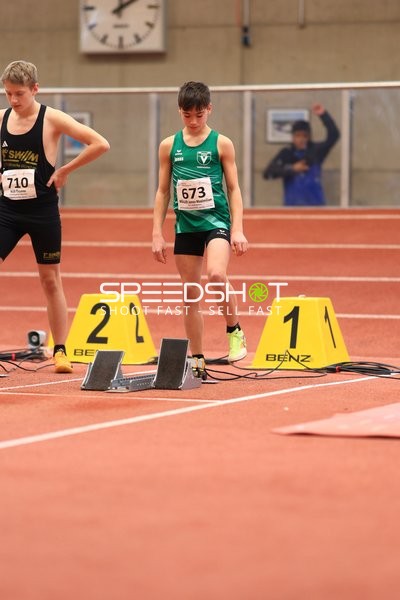 Athleten an Startblöcken