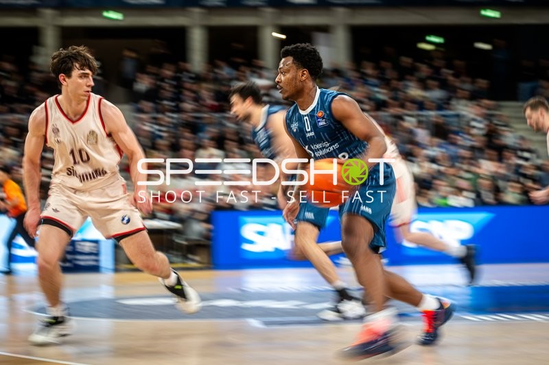 Spielaktion mit DJ Horne (0; MLP Academics Heidelberg) und Justinian Jessup (10; FC Bayern Basketball)