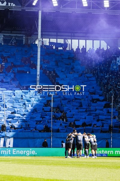 Teamkreis auf dem Spielfeld